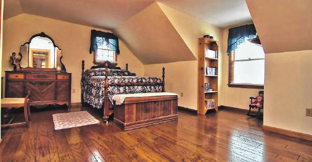 On the home s lower level is a gigantic den / study along with several storage areas as well.