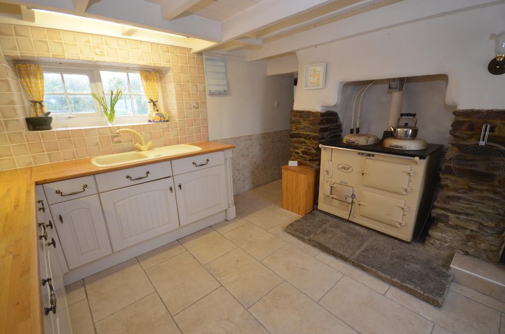 Property Description Veronica Cottage is surrounded by open countryside and set within a 1/3 of an acre plot of well stocked, south facing gardens within which sits a detached single garage with log