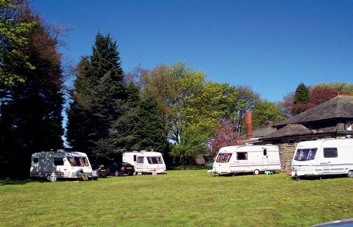 Touring Caravan and Camping Area To the south and north of the bunkhouses are the main touring caravan and camping areas, comprising 60 grass pitches accessed via a circular gravel surfaced road.
