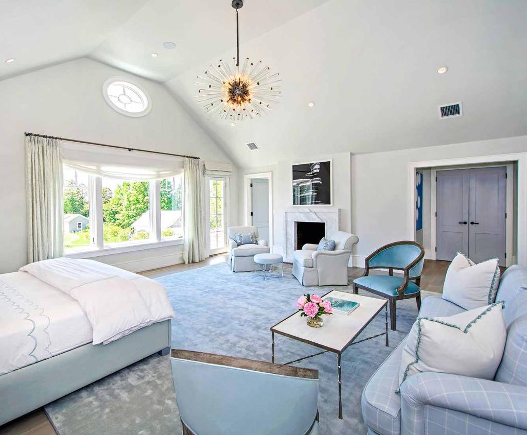 OPULENT MASTER SUITE The master suite is its own paradise with an entry foyer, vaulted