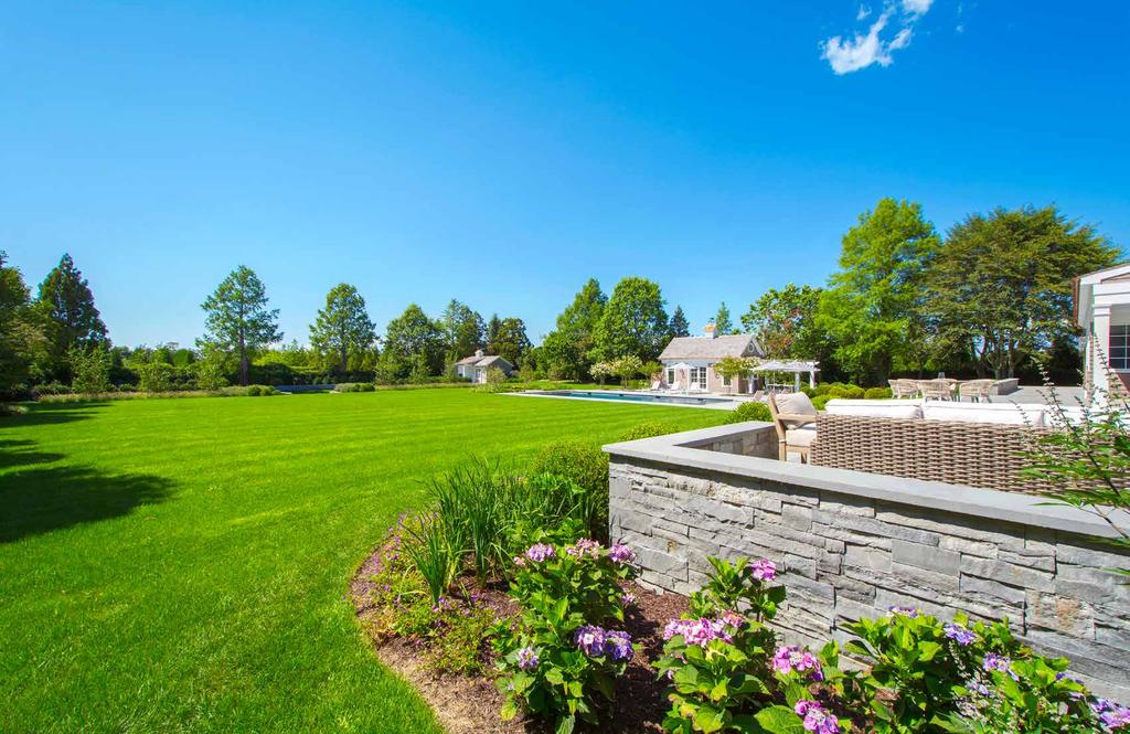 PRISTINE LANDSCAPING PRISTINE LANDSCAPE ARCHITECTURE The lush gardens were impeccably created by Jonathan Davis, ensuring total privacy while integrating the property s great vision and history with