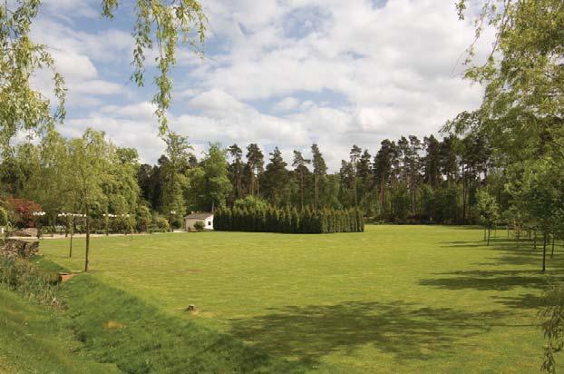 it includes formal gardens, a dramatic lake with 10 metre