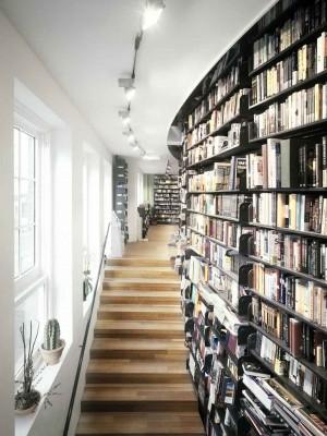 photo: HMADP photo: HMADP ABC Book Store Spui 12 1012 XA Amsterdam http://wwwabcnl/ A new inside of an old piano store turned into a modern book shop A 3 story high book wall pertrudes through the 3