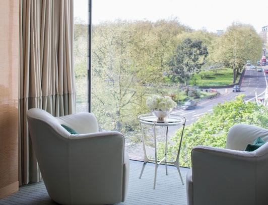 Our bright, airy Mayfair Suites look through a floor-to-ceiling bay window onto the lush landscapes of Hyde Park.