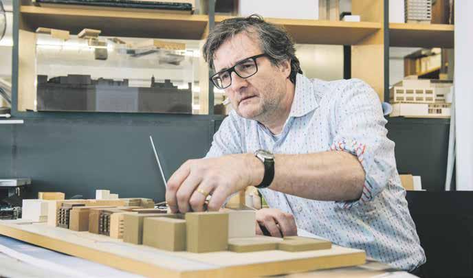 Graham Haworth of Haworth Tompkins Architects Fish Island Village has been brought to life by a team of architects and designers.
