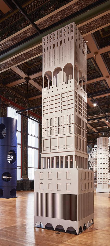? Observe Sam Jacob Studio s tower. The architects borrowed elements from other towers in the 1922 competition that did not win. What different shapes do you see? What color is the model?