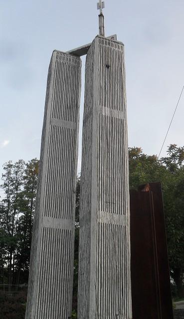 Hale Credited With Helping Win WWII TENTH ANNIVERSARY Hudson Favel s carving of the World Trade Towers as they appear on display at Tri-angle Park, maintained by the Renaissance.