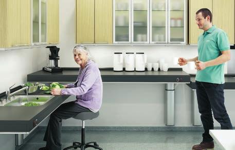 When using adjustable worktops next to each other and/or adjustable cupboards above the adjustable worktop, safety interconnections should be included.