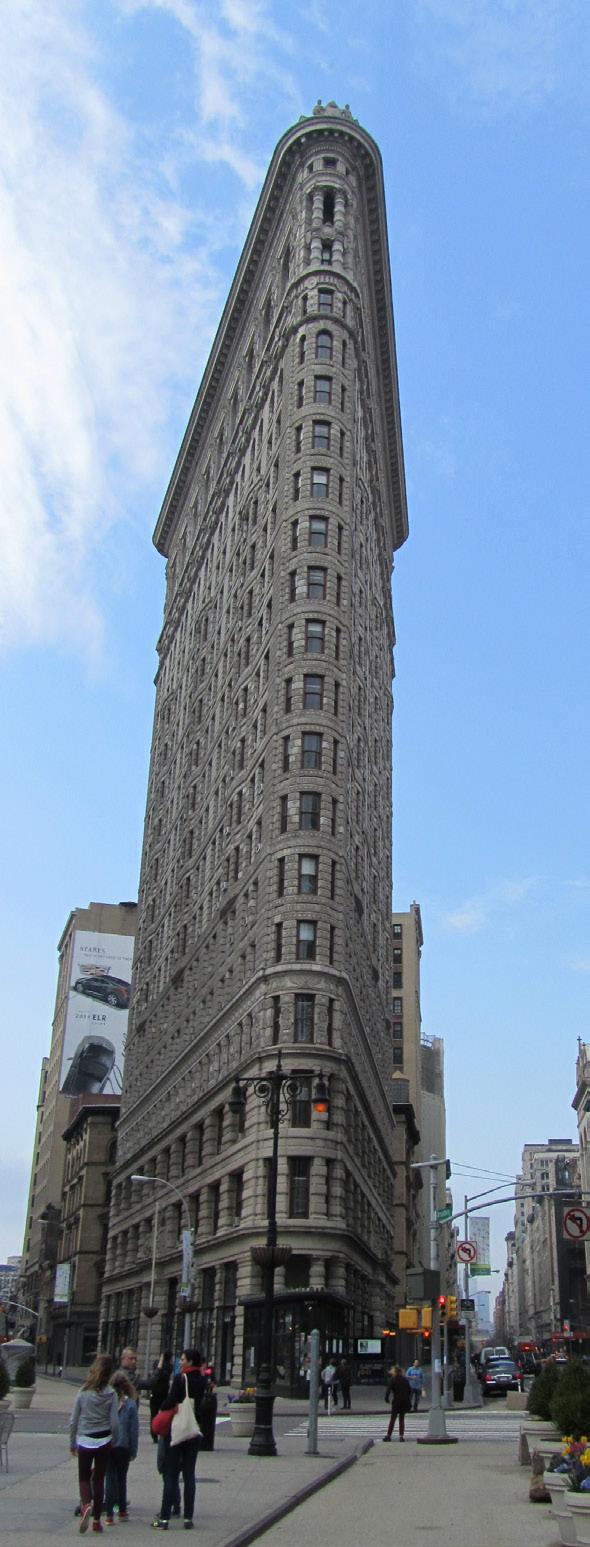 The Building Today Although never the tallest building in New York, or even the first building in the country with a triangular ground plan, the Flatiron Building remains an iconic symbol of the city