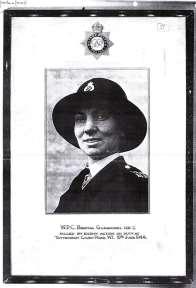 A framed commemorative photographic portrait of Bertha in uniform bearing the Force Badge and words W.P.C.