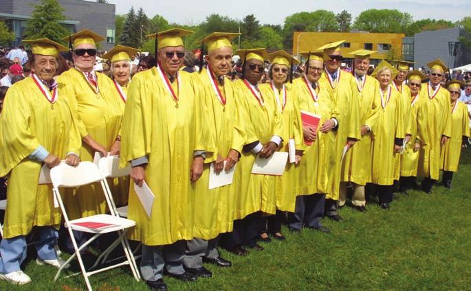 Fifteen Golden Hawks members of the Class of 1958 led the procession onto the Gengras lawn at Commencement in May.