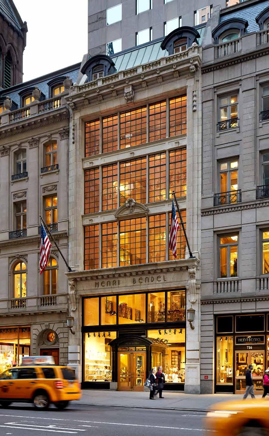 Each boutique is separated from the atrium space by traditional steel and glass storefronts.