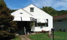Secluded 3 BR, 2 full BA, A-Frame w/lg rooms & wrap-deck. Lots of privacy in Wooded area. Has fireplace. $67,900 PROCTORVILLE OHIO 3 BR, 1.5 BA, 1 story, att. garage, equipped kitchen, frpl.