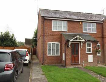 LOT 1 Guide Price 100,000-110,000 16 Bryn Y Pys Court, Overton, Wrexham, LL13 0EJ The Property Modern two bedroom end terrace house.