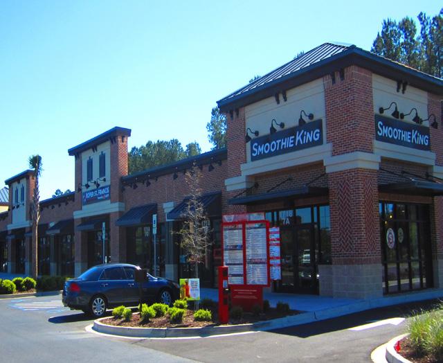 This shopping center is directly across from Cane Bay High School, one of the largest high school campuses in South Carolina.
