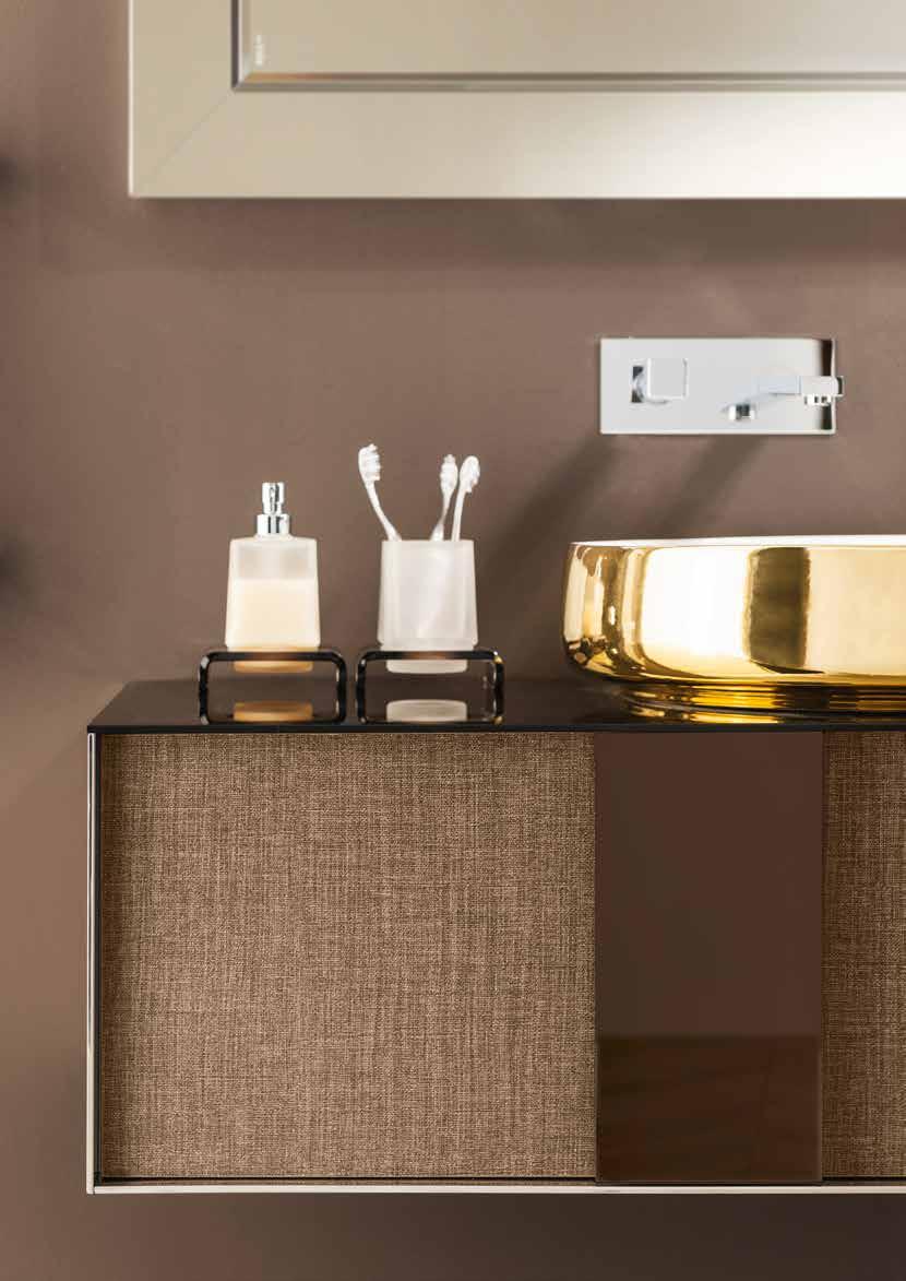 l ambiente. Base units for washbasins with different handle placements, as interpreted by the designer Sergio Brioschi.
