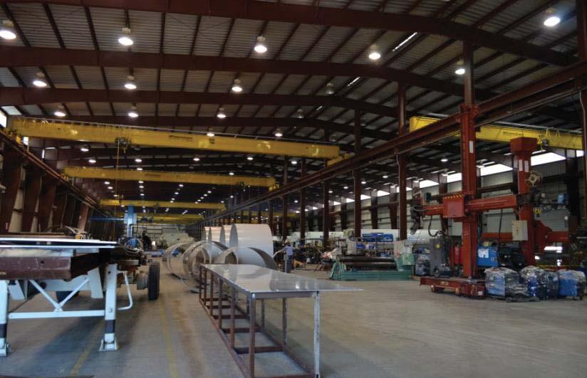 The east side has; eight (8) 10-ton bridge cranes, two (2) 20' wide x 25' high overhead doors at each end and eight (8) 16' X 16' overhead doors on the side.
