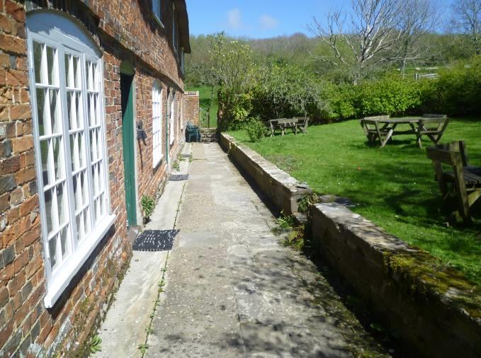 Arrival & Parking Facilities The cottage is located approximately 4 miles from Bridport, and is approached down an undulating single track road running down the valley from the main A35 There is