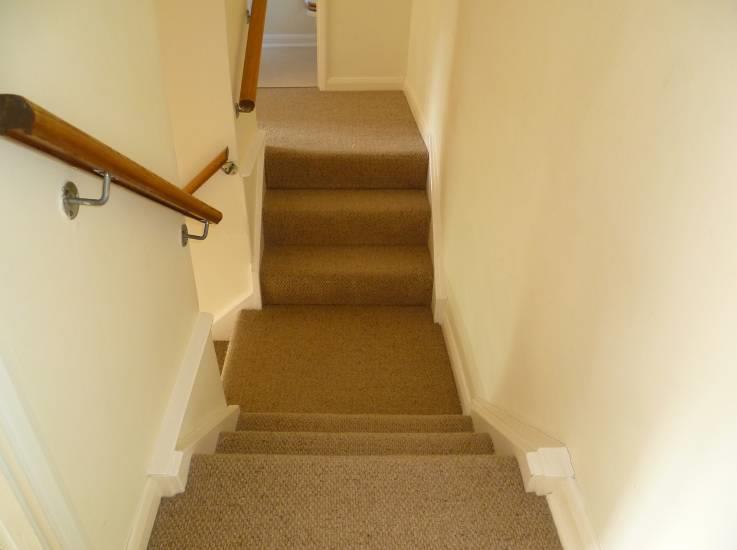 The stairs lead to two small landings, off which are the double, twin and single bedrooms and bathroom.