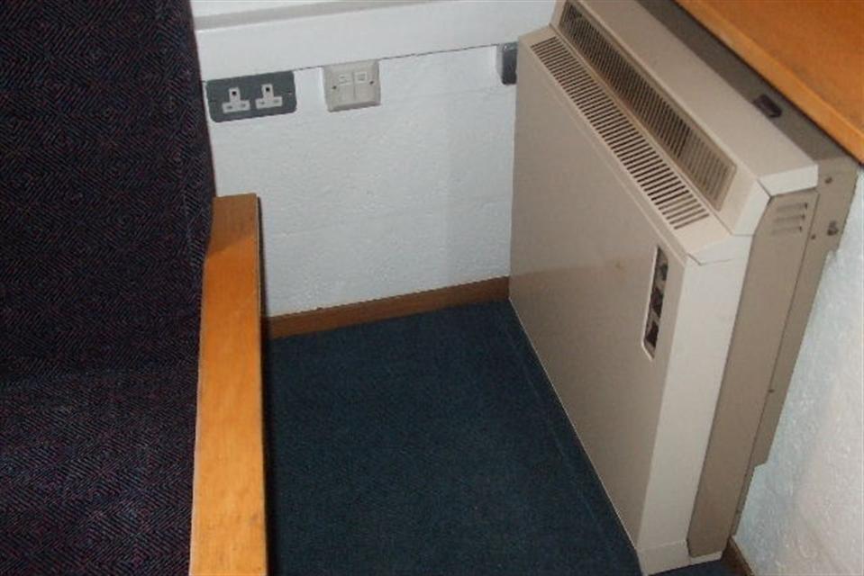 Accomodation 47, 48, 51 single bedrooms generic: Example of heating controls and power sockets at