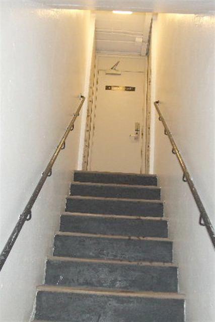 Accommodation 47 entrance staircase with handrailings provided to