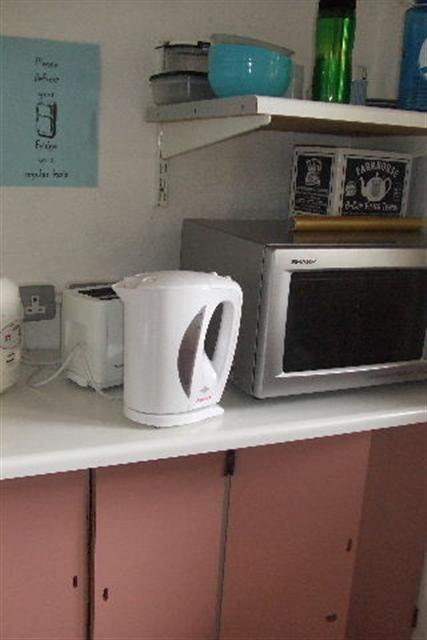 Cordless kettle, toaster and microwave control buttons height