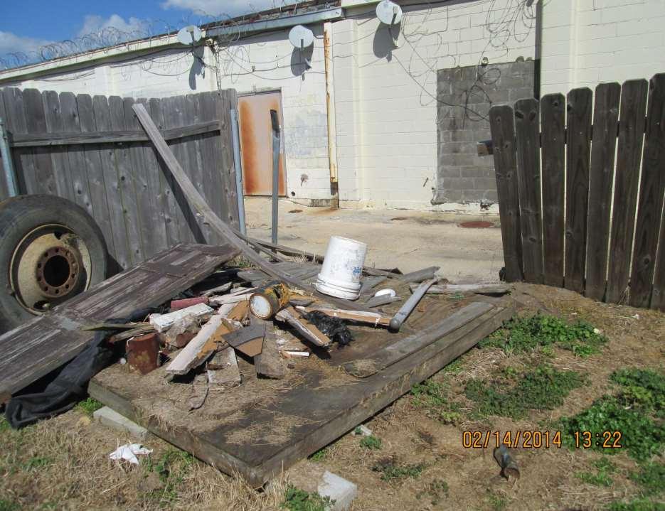 You might think this trashy yard belongs to a home in a run down neighborhood, but you would