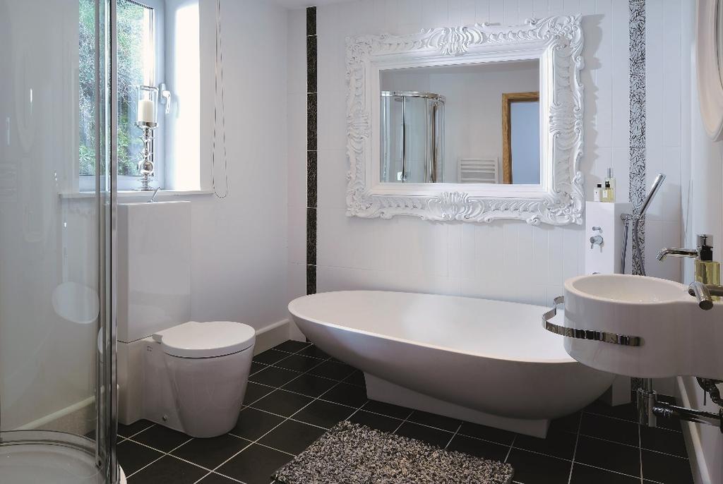 En-suite Bathroom: Comprising Duravit suite of wash hand basin and w.c.