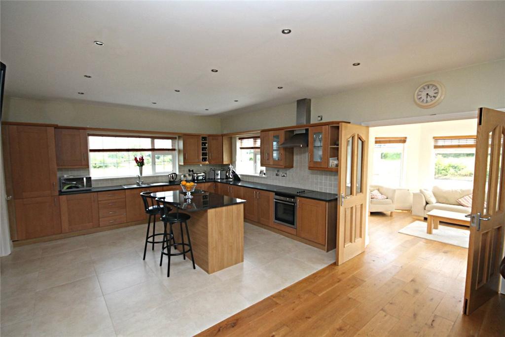 centre island with granite worktops (appliances included), solid white oak floors in the main rooms along with solid white