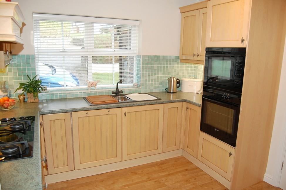 BREAKFAST KITCHEN 11'11" (3.63 M) x 10'4" (3.15 M) approx. Coved ceiling and centre track halogen lighting. upvc double glazed window to front aspect.
