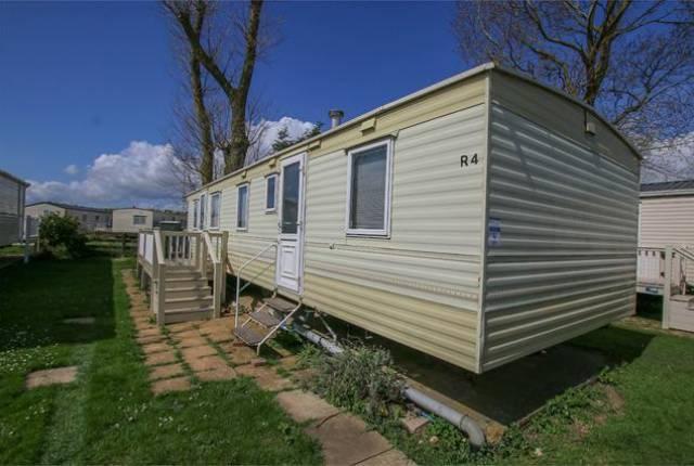 SITE FEES 16,950 GUIDE PRICE 16,811 A 3 bedroom caravan situated in the
