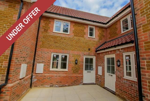 A quality development of 6 brick and carrstone cottage style properties