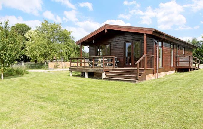 Heron Lodge Single storey detached lodge providing entrance hall, open plan sitting room, dining room and kitchen