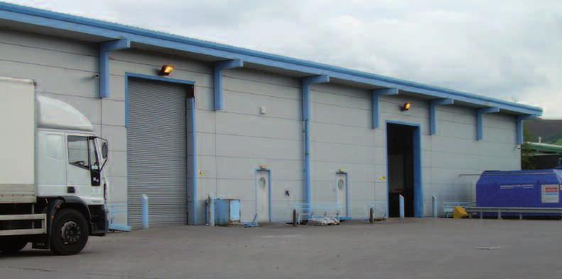 offices at the front and a secure rear yard. The warehouse has two up and over loading doors, eaves height of approximately 6.