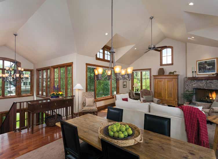 6 Interior Features Entry staircase, dining and living areas with cathedral and gabled ceilings, fireplace with stone surround This gorgeous home designed with three levels emanates mountain