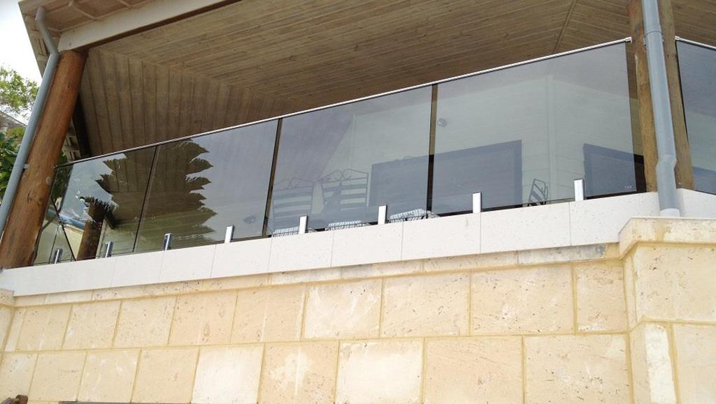 FG1 / System 3 Frameless Glass Balustrade Frameless glass balustrade comprising of 25mm square handrail, 316 stainless steel spigots, and all required fittings.