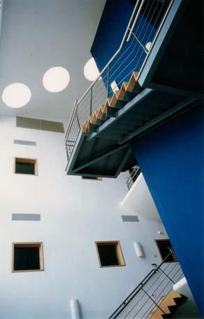 Reference Painted staircase with balustrades and stainless steel top rail