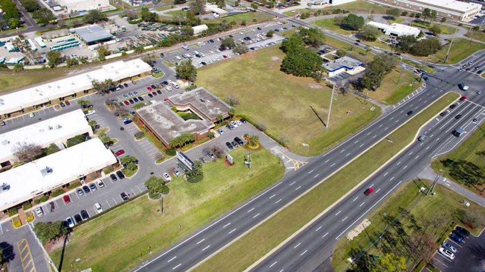 Aerial View CHANCELLOR DR Full Access The property sits directly between the traffic lights at President s Drive and Chancellor Drive.
