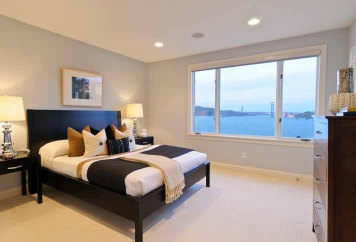 The spacious MASTER BEDROOM enjoys the spectacular Bridge and Marin headland views.