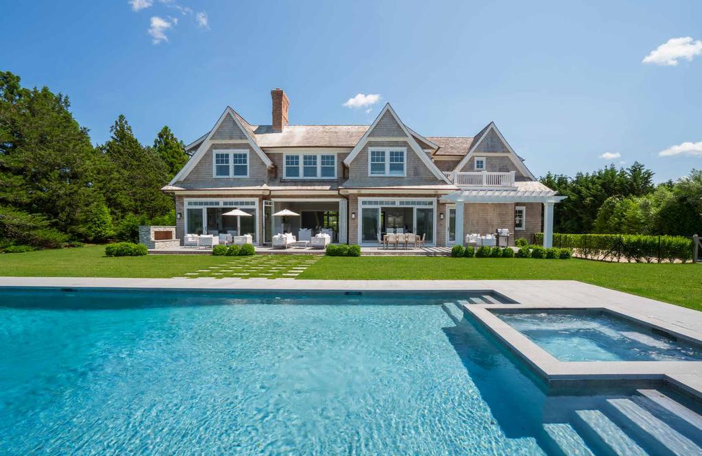 CAREFULLY BLENDING MODERN WITH TRADITIONAL STYLE, THIS ATTRACTIVE ESTATE ACCENTUATES THE HAMPTONS LIFESTYLE BY ARTFULLY INTEGRATING