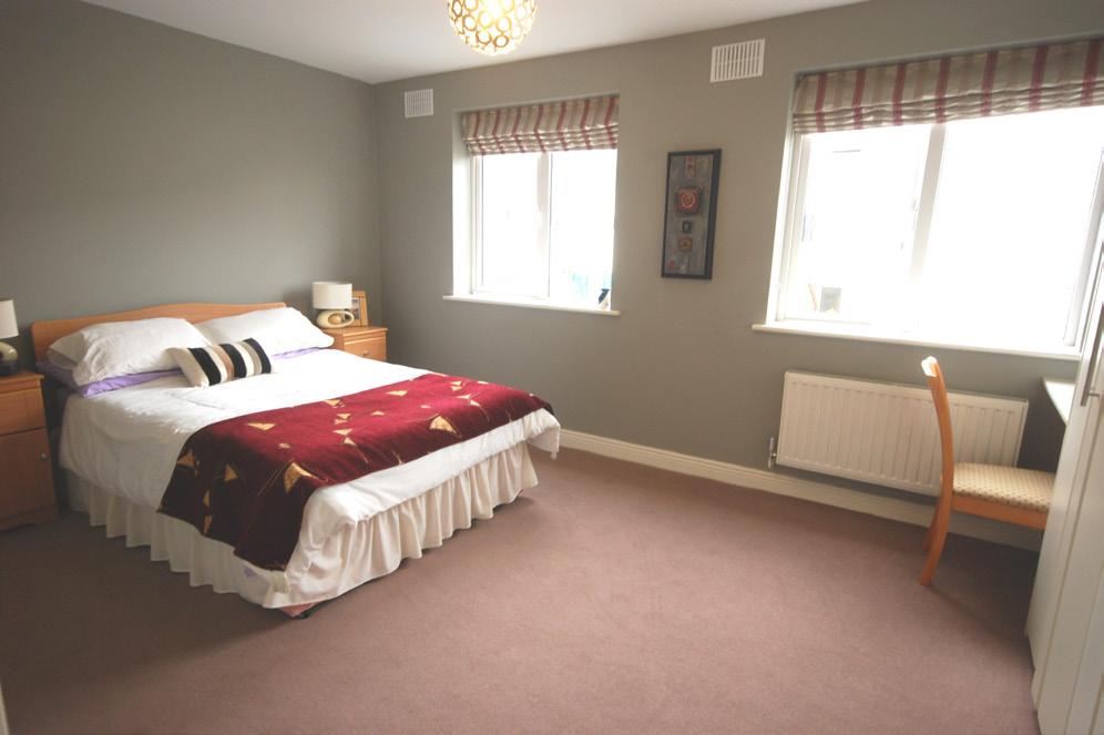 ACCOMMODATION UPSTAIRS High quality carpeted stairs and landing with access to hotpress. MASTER BEDROOM 13 4 x 15 7 (4.1m x 4.