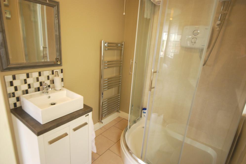 BATHROOM 8 2 x 5 6 (2.5m x 1.7m) Jack & Jill bathroom with ceramic tiled floor. Full size bath with shower attachment.