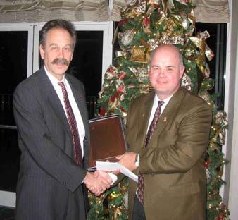 Institute Education Trust Fund David Ortegon, right, received the