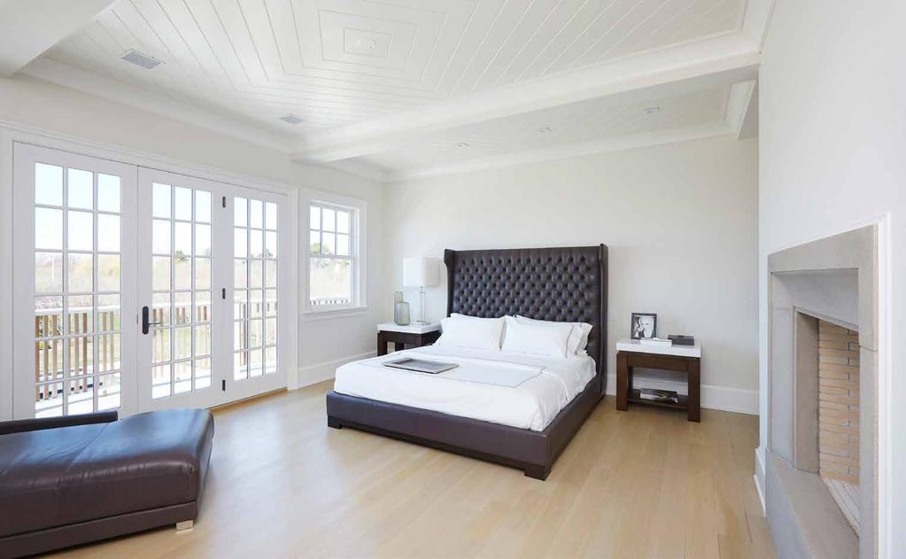MASTER SUITE The master suite is privately nestled in the uppermost stunning view level and encompasses a