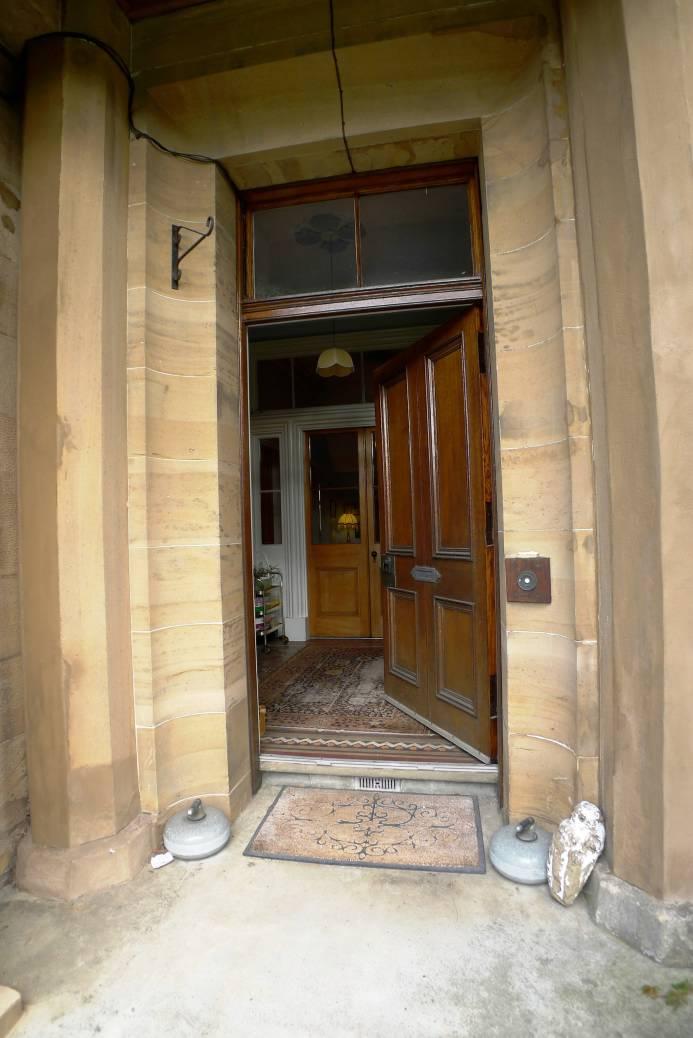 The accommodation comprises of entry through imposing pillars into a broad entrance vestibule, reception hallway, lounge with bay window to the front and feature open fireplace, formal dining room