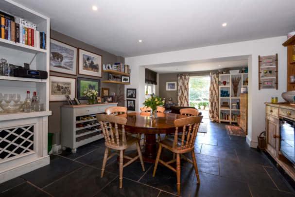 Bespoke fitted kitchen Second floor games / loft room Believed to have been built around the end of the 19th century, the cottage has many architectural features combining a mixture of brick, flint