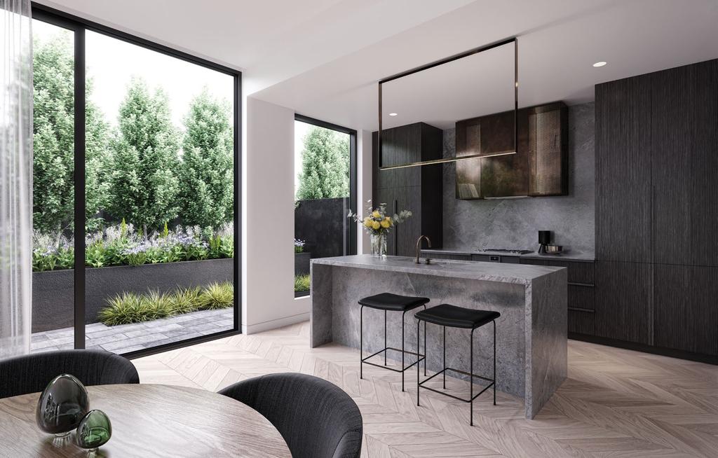 20 THE WOODS 21 INTERIORS Solidity and simplicity are behind the design of the kitchens.
