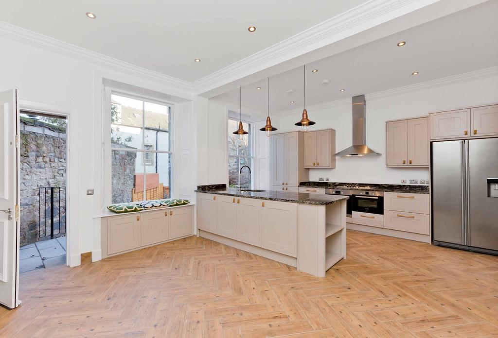 Promising a timeless, high-quality finish, the kitchen is fitted with a wide selection of classically-designed cabinets
