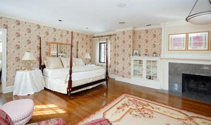 fireplace, a new walk-in closet with stone floor and imported cabinetry,