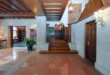 The floor of the entry hall is a mix of honed and polished